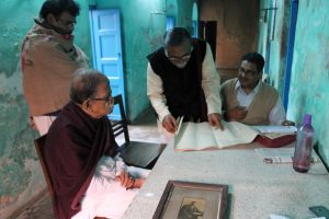 Local historians in Chandannagar, discussing the Sen family tree at the birthplace of Jogendra Nath Sen ©Leeds Museums & Galleries, photographed by Lucy Moore