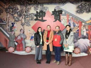 Zhang Linjie, his colleagues from the Palace Museum, Beijing and I at the entrance to the exhibition ‘Celebrating the Spring Festival in the Forbidden City’.
