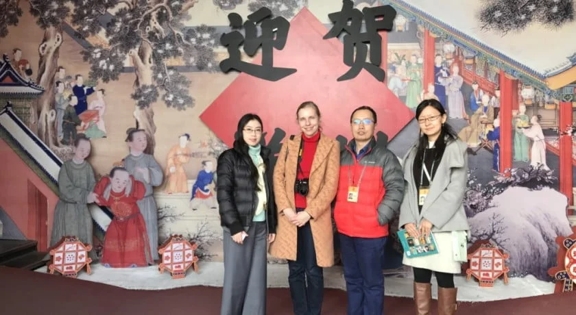Zhang Linjie, his colleagues from the Palace Museum, Beijing and I at the entrance to the exhibition ‘Celebrating the Spring Festival in the Forbidden City’.