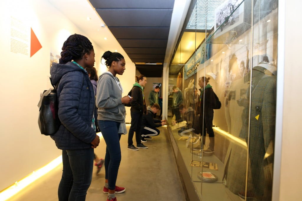 People standing in front of a display